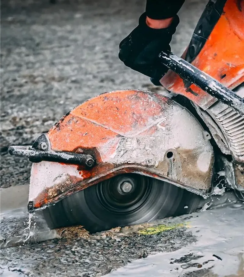 Astrocut B100 Value Concrete Brick Masonry Diamond Blade 6 Concrete saw cutting through slab with diamond blade during wet cutting